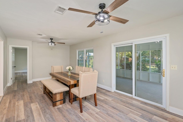 dining room featuring ceiling fan and light wood-type flooring