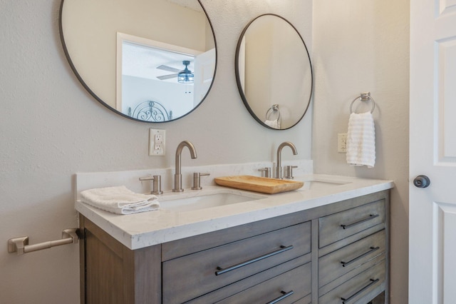 bathroom with vanity and ceiling fan