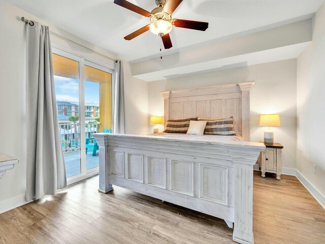 bedroom featuring ceiling fan, access to exterior, and light wood-type flooring