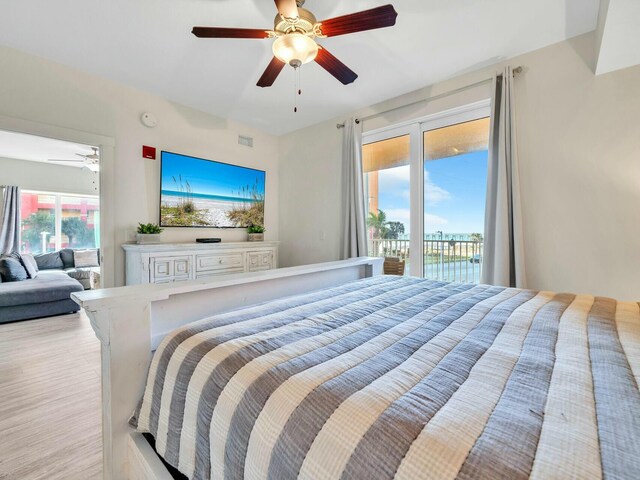 bedroom featuring access to outside and ceiling fan