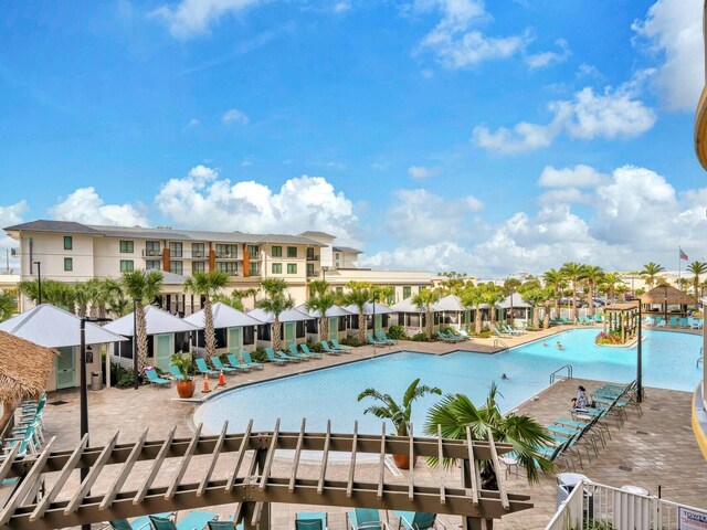 view of pool featuring a patio area