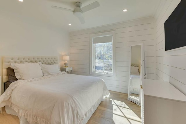 bedroom with light wood-style floors, recessed lighting, and ceiling fan