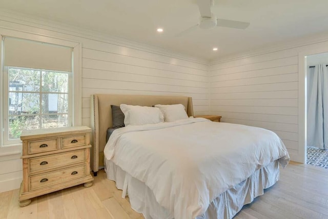 bedroom featuring ceiling fan, recessed lighting, light wood-style flooring, and crown molding