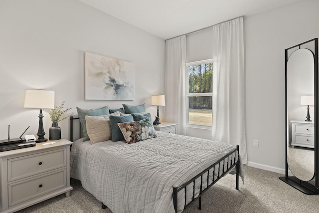 bedroom with light colored carpet