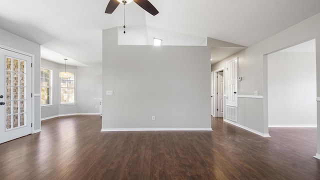 unfurnished room featuring ceiling fan, dark hardwood / wood-style flooring, and lofted ceiling