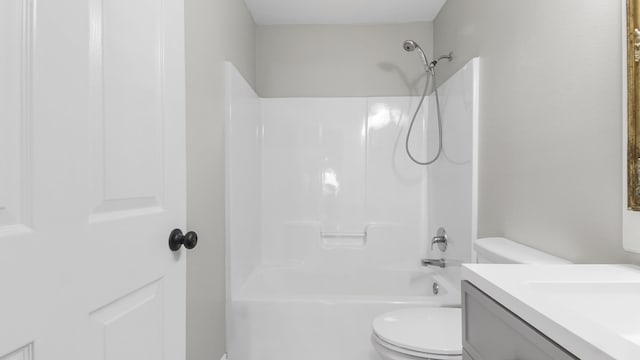 full bathroom featuring vanity, toilet, and tub / shower combination