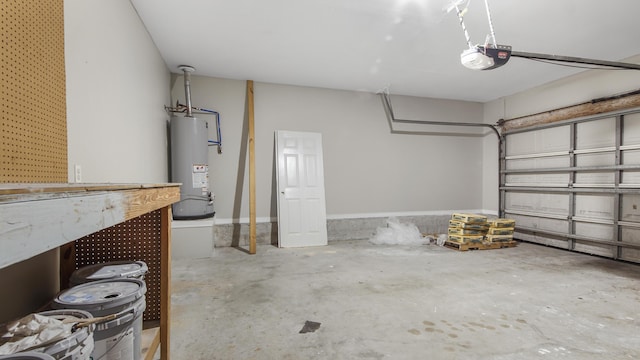 garage with a garage door opener and gas water heater