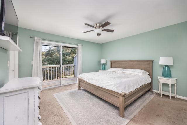 carpeted bedroom with ceiling fan and access to outside