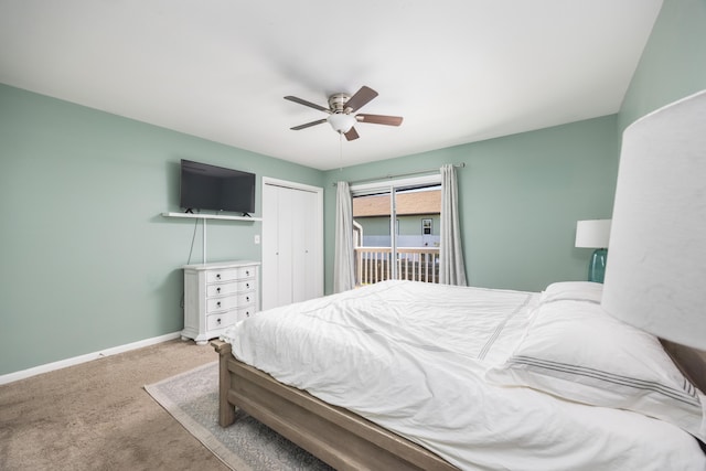 carpeted bedroom featuring a closet and ceiling fan