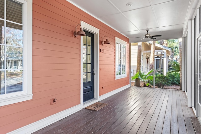 deck featuring ceiling fan and covered porch