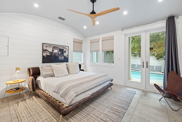 bedroom featuring vaulted ceiling, access to outside, ceiling fan, and french doors