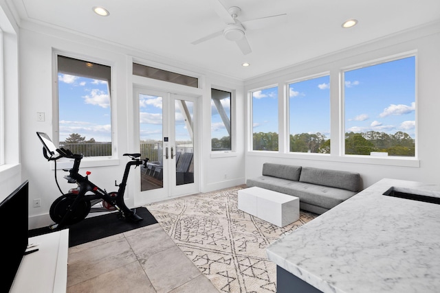 interior space featuring ceiling fan and french doors