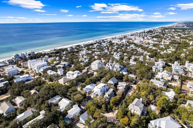 bird's eye view with a beach view and a water view