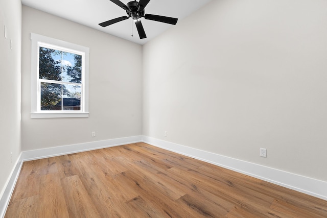 spare room with light hardwood / wood-style floors and ceiling fan