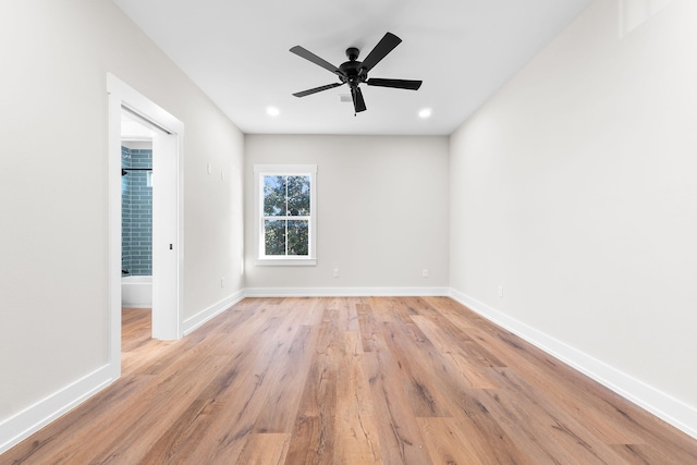 unfurnished room with light hardwood / wood-style floors and ceiling fan