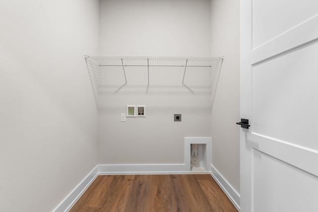 clothes washing area featuring hookup for a washing machine, electric dryer hookup, and wood-type flooring