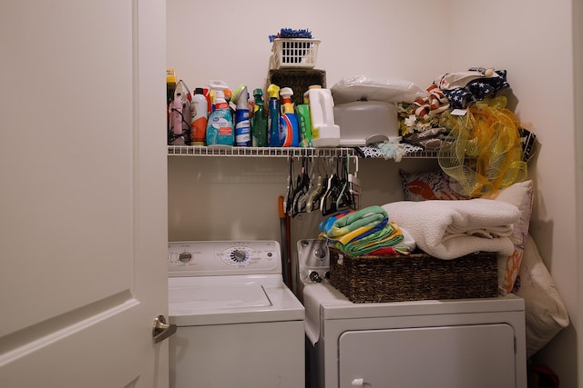 washroom featuring washing machine and dryer