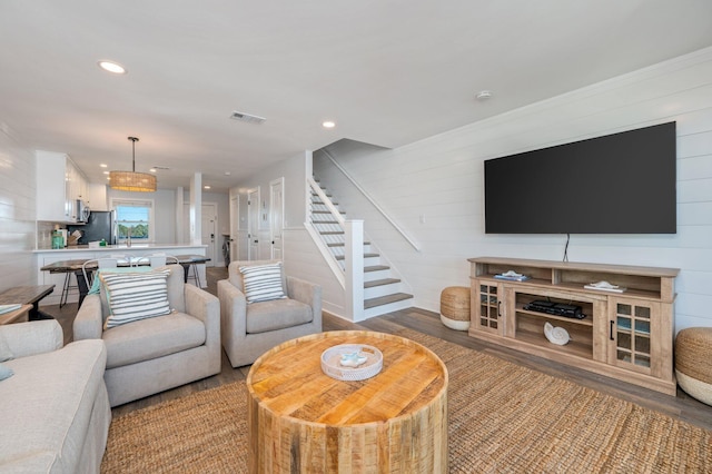 living room with hardwood / wood-style floors