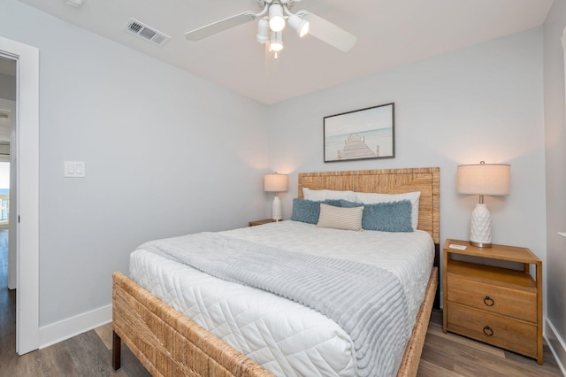 bedroom featuring hardwood / wood-style floors and ceiling fan