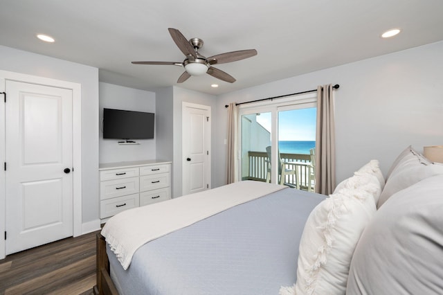 bedroom featuring ceiling fan, dark wood-type flooring, and access to outside