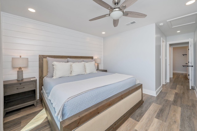 bedroom featuring ceiling fan and wood-type flooring