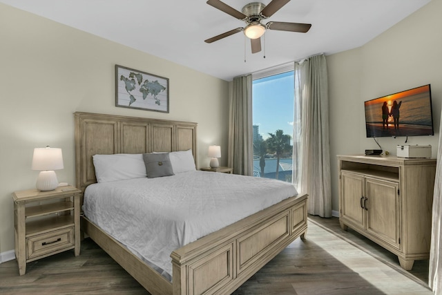 bedroom featuring ceiling fan and wood-type flooring