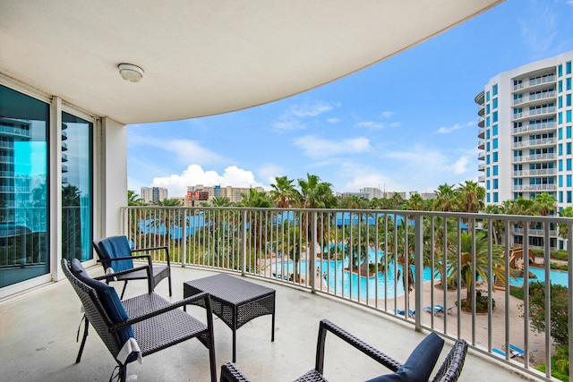 balcony featuring a water view