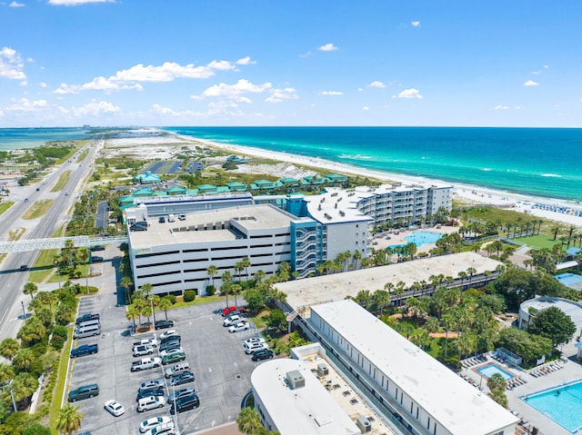 bird's eye view with a beach view and a water view