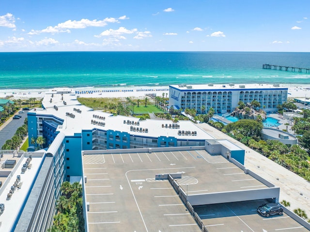 bird's eye view with a beach view and a water view