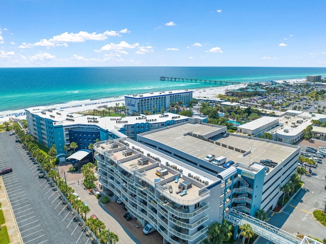 bird's eye view with a beach view and a water view