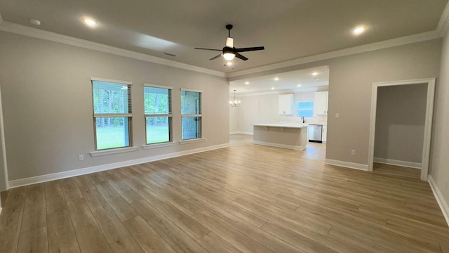 2718 Louis Cir, Crestview, FL 32536 - unfurnished living room with ceiling fan, light wood-style flooring, baseboards, and ornamental molding