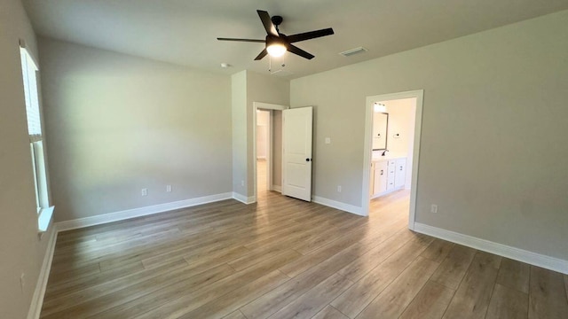 2718 Louis Cir, Crestview, FL 32536 - unfurnished bedroom featuring visible vents, wood finished floors, and baseboards