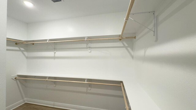 2718 Louis Cir, Crestview, FL 32536 - spacious closet with wood finished floors