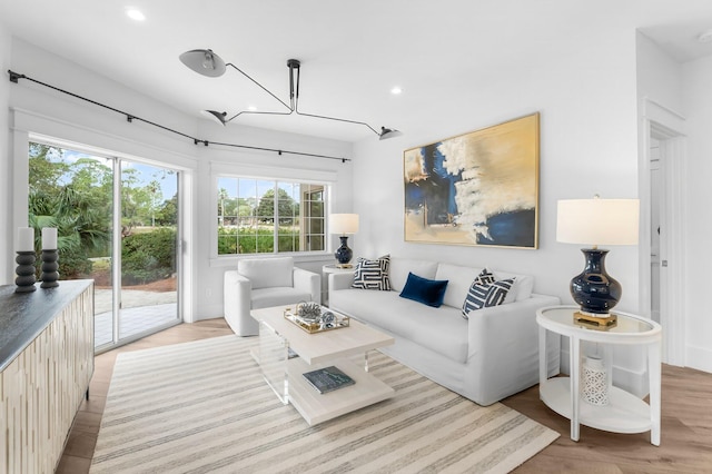 living room with an inviting chandelier