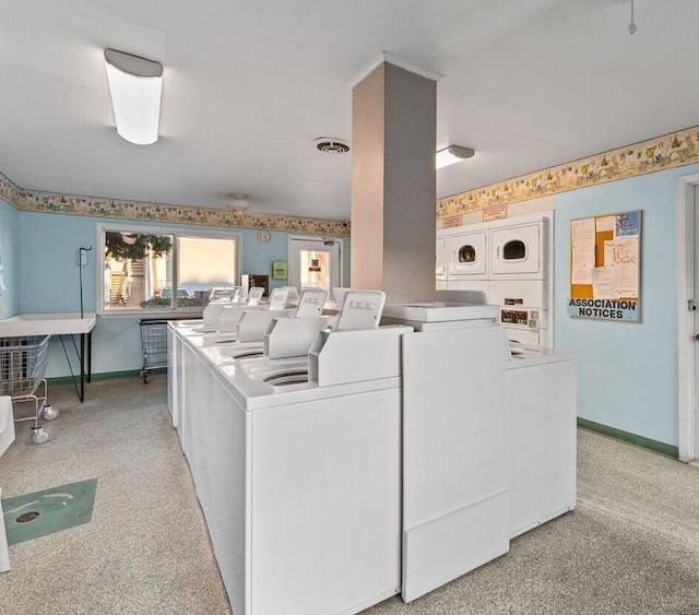 101 Old Ferry Rd Unit 12B, Shalimar, FL 32579 - shared laundry with washing machine and clothes dryer, light carpet, and stacked washer / drying machine