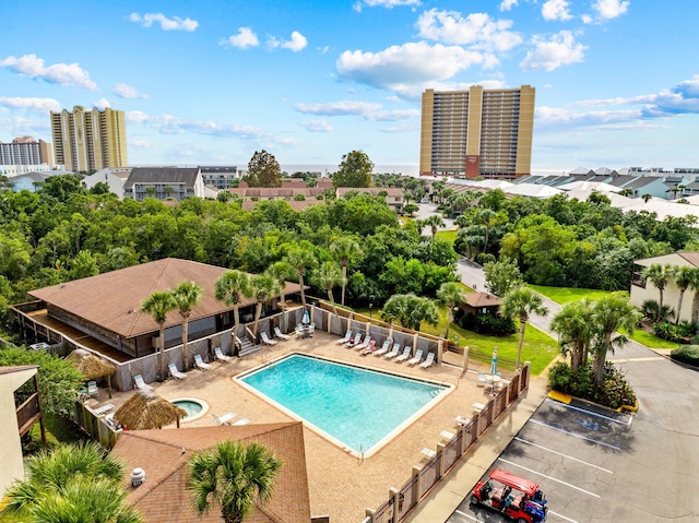 view of swimming pool featuring a patio area