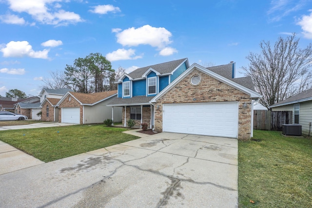 view of front facade with cooling unit, a garage, and a front yard