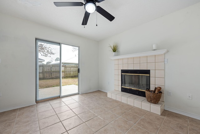 unfurnished living room featuring a fireplace and light tile patterned floors