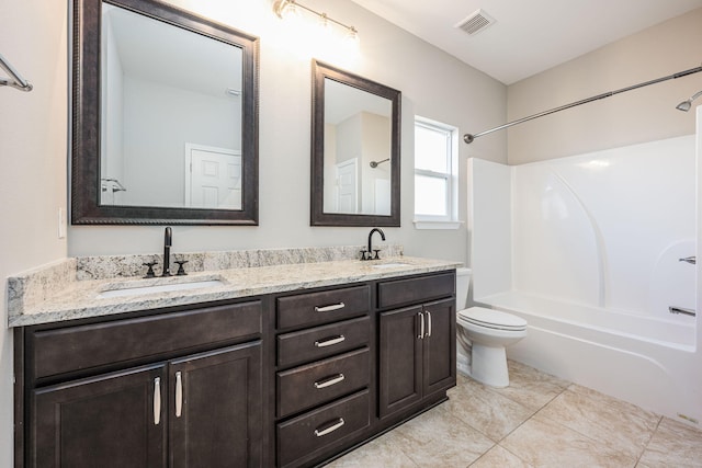 full bathroom featuring vanity, toilet, and bathtub / shower combination