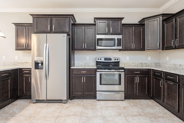 kitchen with dark brown cabinets and appliances with stainless steel finishes