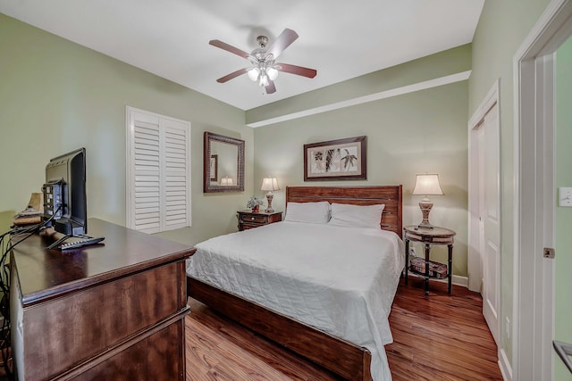 bedroom featuring ceiling fan and hardwood / wood-style floors