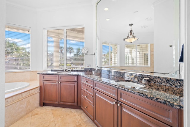 bathroom with tile patterned flooring, vanity, a relaxing tiled tub, and crown molding