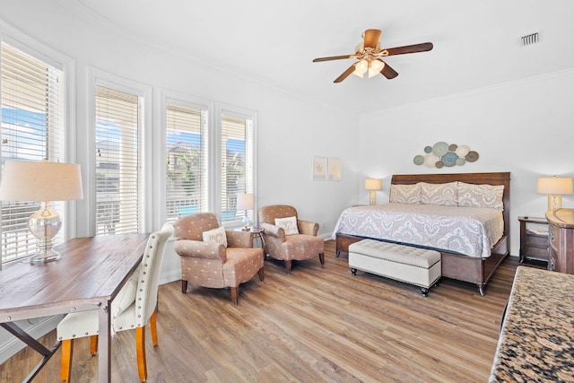 bedroom featuring ceiling fan and hardwood / wood-style floors