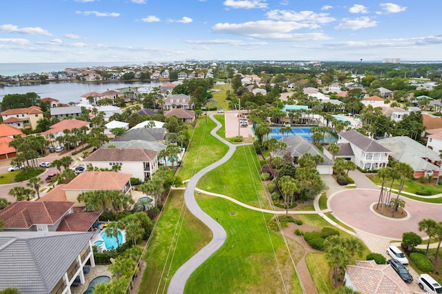 bird's eye view with a water view