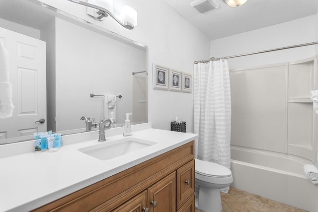 full bathroom featuring toilet, shower / bath combo with shower curtain, vanity, and tile patterned flooring