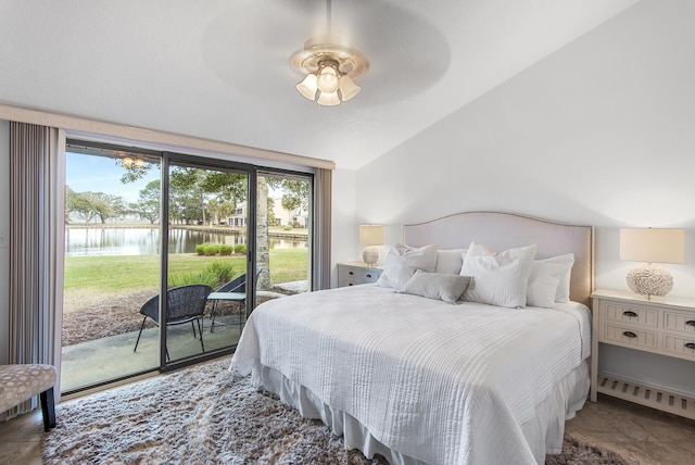 bedroom with access to exterior, ceiling fan, floor to ceiling windows, lofted ceiling, and a water view