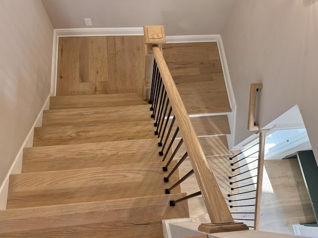 stairway with baseboards