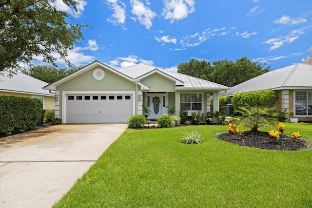 ranch-style home featuring a garage and a front lawn