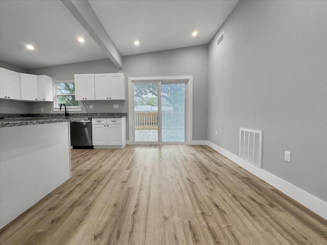 kitchen with sink, lofted ceiling with beams, light hardwood / wood-style flooring, dishwasher, and white cabinets