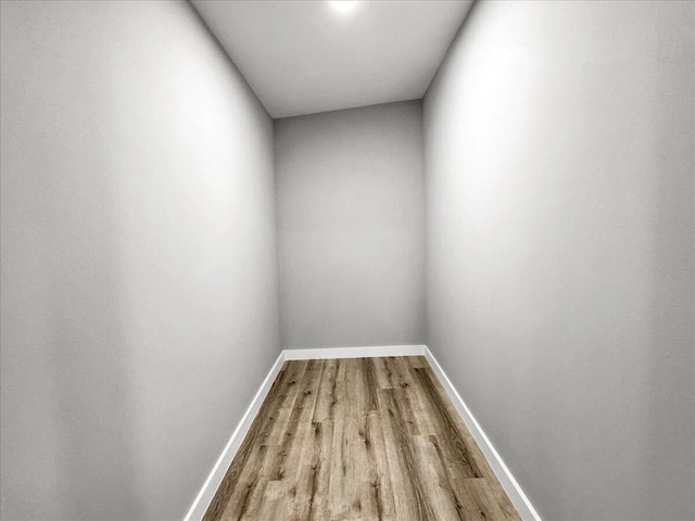 empty room with wood-type flooring